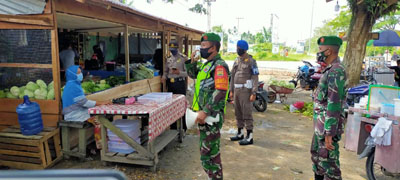 Babinsa Koramil 03/Siak Beri Imbauan Protokol Kesehatan kepada masyarakat